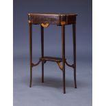 An Edwardian rosewood and satinwood inlaid side table, the shaped top centred by inlaid patera, over
