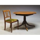 A George III style mahogany D-end extending dining table, late 20th Century, the top with one