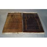 An Afghan prayer rug, 150cm x 97cm together with another Afghan prayer rug, 149cm x 108cm wide (2)