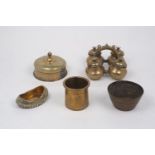 A collection of Indian brass and copper vessels, 20th century, to include: a quartet of spice