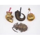 A group of four of Indian brass vessels, 20th century, to include: a shell form purse, with hinged