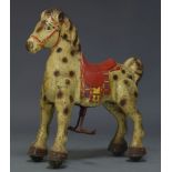 A painted metal Mobo Bronco ride-along horse, 1950s, stamped MADE IN ENGLAND, both footrests