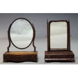 A George III mahogany toilet mirror, with oval plate on serpentine fronted base, with three drawers,