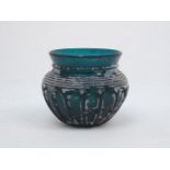 AMENDMENT. Please note this lot is 20th Century. A Roman-style green glass ribbed bowl, 8.4c