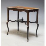 An Edwardian rosewood and inlaid side table, the shaped top on cabriole legs united by x shaped