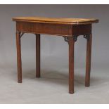 A George III and later mahogany tea table, with the later fold over top, on square moulded legs,