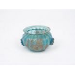 AMENDMENT. Please note this lot is 20th Century. A Roman-style turquoise blue glass vessel with a