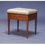 An Edwardian mahogany and satinwood banded music stool, with hinged floral gros-point needlework