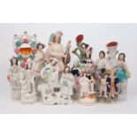 A selection of Staffordshire figural groups and figures, 19th century and later, to include spill