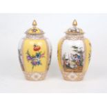 A pair of Dresden Augustus Rex vases and covers, 19th Century, painted with panels of scenes after