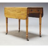 A mahogany Pembroke table, 19th Century, the rounded rectangular top above single frieze drawer with