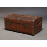 A vintage travelling trunk, twentieth century, of typical rectangular form with ridged wood
