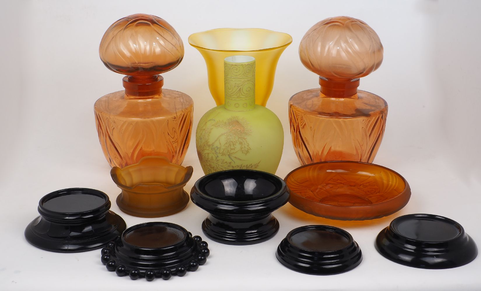 A pair of large 'Faberge' amber glass 'FLEURS DU MONDE' perfume display bottles, c.1972, moulded