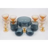 A grey glass trifle bowl set, comprising: a trifle bowl, as of circular plain polished form,