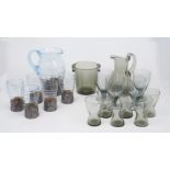 A grey glass lemonade set, comprising: a plain polished jug, 19cm high and matching ice bucket, with