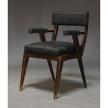 An Italian stained beech armchair, in the manner of Osvaldo Borsani, c.1950, with charcoal grey