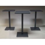 A set of three bar tables by Emu, of recent manufacture, in dark metallic grey powder coated