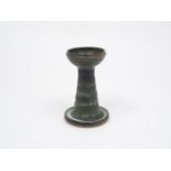 A collection of modern studio pottery style wares, to include: a stoneware candlestick, with