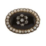 An early 19th century diamond, enamel and seed pearl brooch, the central old and rose-cut diamond