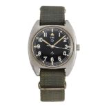 A 1970s stainless steel, British military issue W 10 wristwatch by CWC, the black enamel dial with