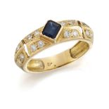 A sapphire and diamond half-hoop ring, the central cut-cornered rectangular sapphire set at an angle