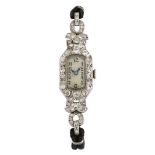 A lady's Art Deco platinum and diamond wristwatch, the rounded rectangular dial with Arabic numerals