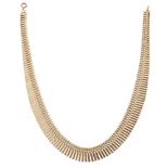A 9ct gold necklace, of fancy link design suspending a graduated fringe of rectangular links,