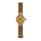A lady's 9ct gold wristwatch by Kemp Brothers, the circular dial with Arabic numerals to a reeded