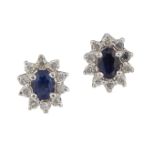 A pair of sapphire and diamond earstuds, each oval sapphire single stone within a brilliant-cut