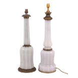 Two glass decorative table lamps, 20th century, one example with faceted body, brass acanthus leaf