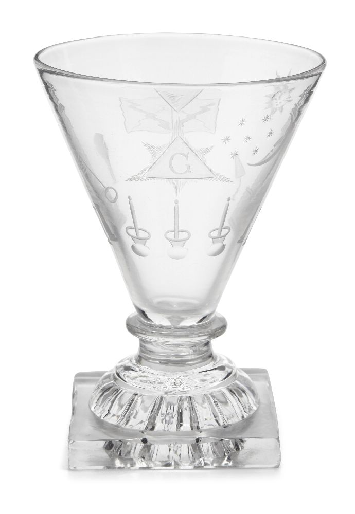 A George III Masonic drinking glass, c. 1790, with conical form bowl, to a lemon squeezer base (