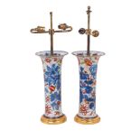 A pair of Imari style vases, early 20th century, converted to table lamps, each of cylindrical