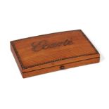 A French satinwood and cut steel Ecarte box, 19th century, the lid titled opening to reveal a fitted