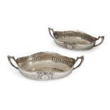 A pair of German silver twin handled dishes, Berlin, c.1900, Eugen Marcus, of shaped, oval form with