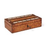 A satinwood games box, 19th century, ivory inlaid with bridge markers to lid, opens to reveal