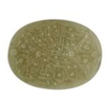 A Mughal inscribed jade seal, India, 19th century, of oval form, inscribed with a mirrored