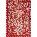 An Ottoman embroidered coverlet, Turkey, first half 19th century, the underlying red ground finely