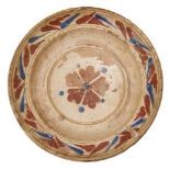 A rare early Canakkale bowl, Turkey, circa 1750, of deep form, underglaze painted in blue with a