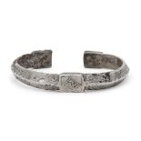 An engraved inscribed silver cuff bracelet, Iran, 14th century, of semi-circular form, with
