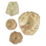 A fine large Byzantine scraffiato bowl fragment depicting a bird of prey, and three smaller