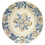 Three rare early Canakkale plates, circa 1750, of deep form, the first underglaze painted in blue