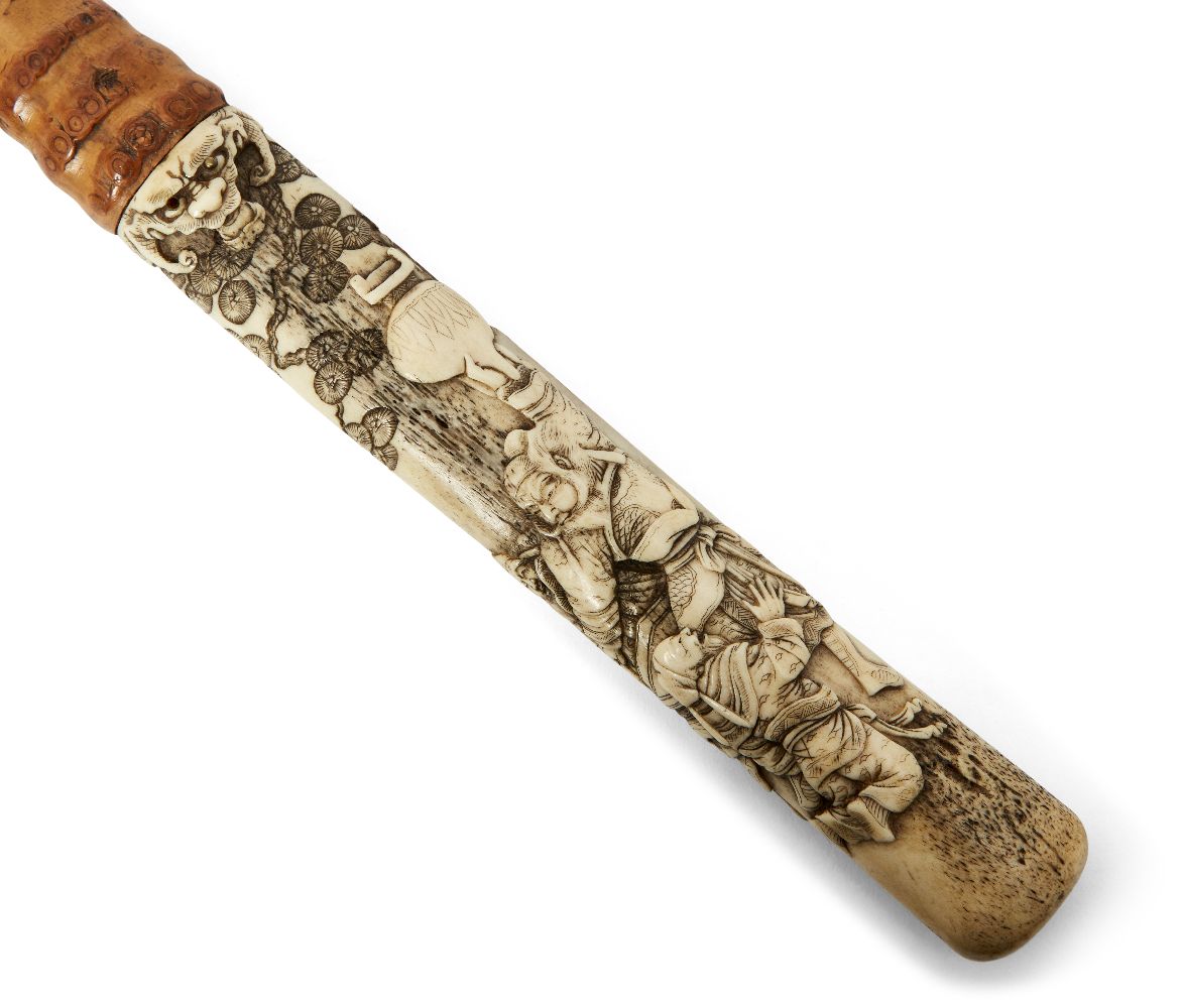 A Japanese parasol with antler handle, 19th century, handle carved intricately depicting shishi head - Image 2 of 2