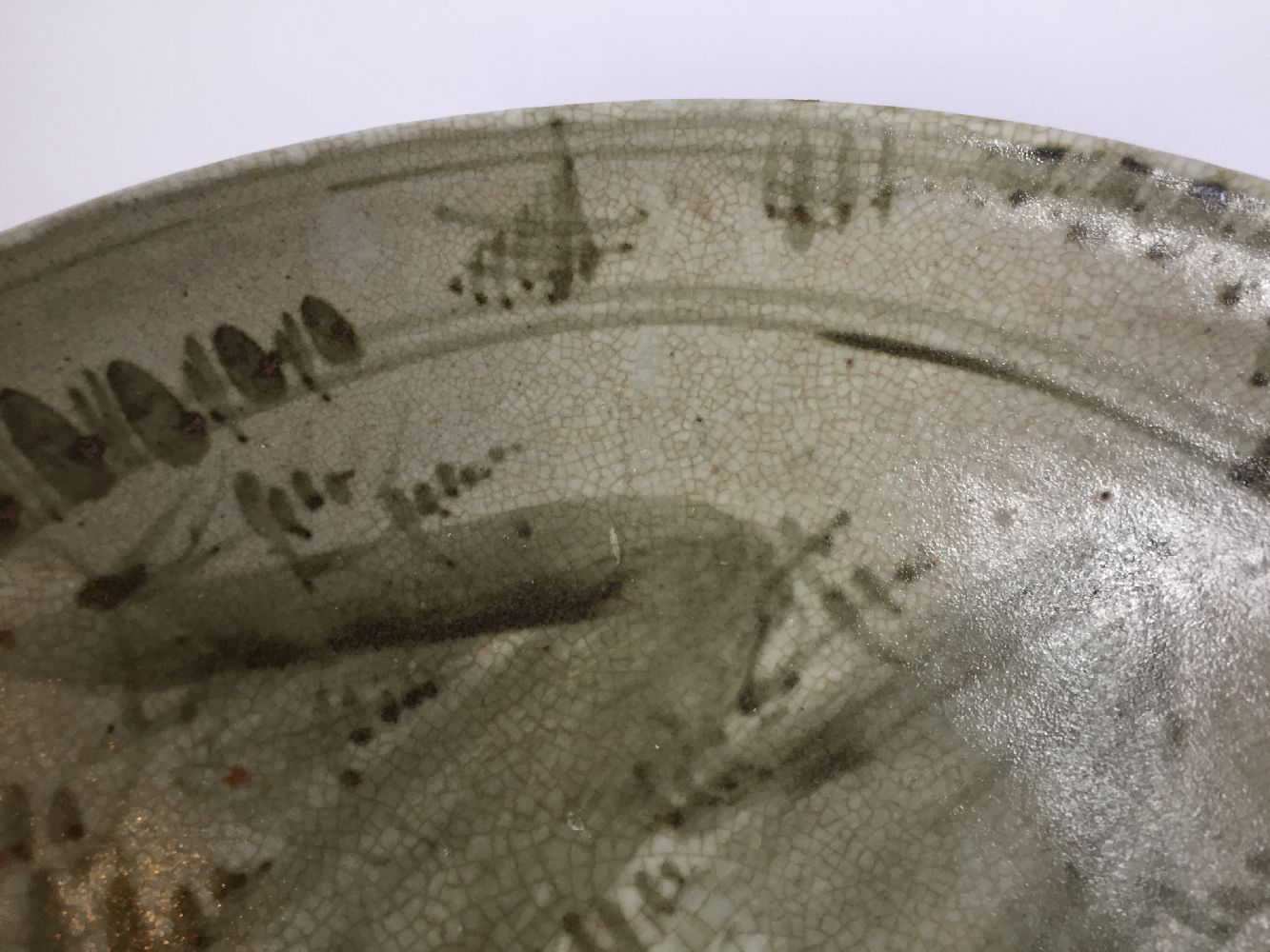 Three Thai Sawankhalok bowls, 15th-16th century, each covered in a celadon glaze, two with fluted - Image 10 of 27