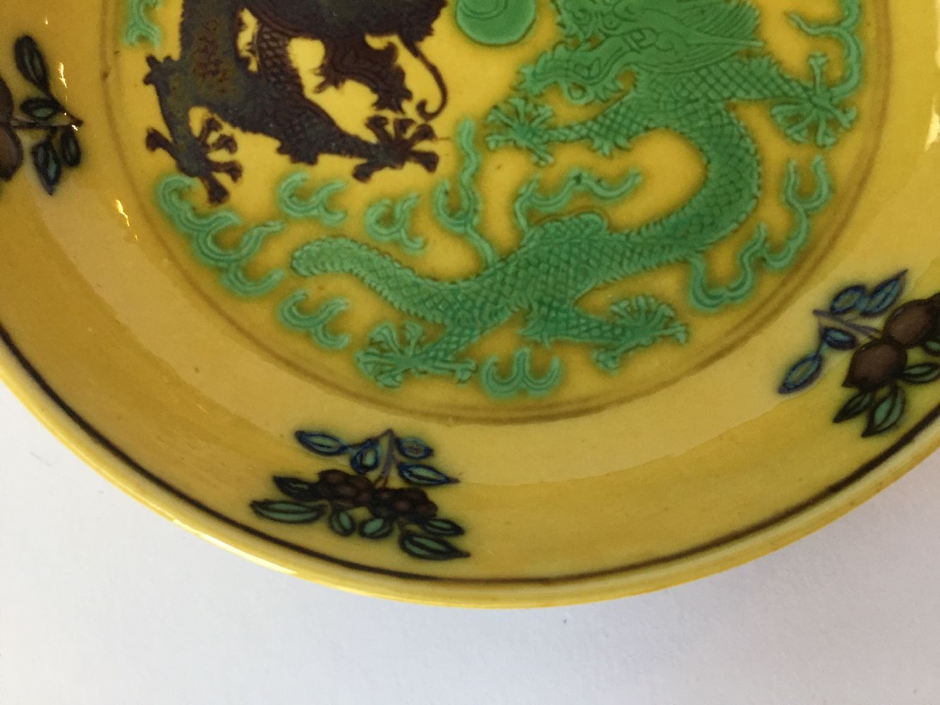 A Chinese small yellow-ground aubergine and green-decorated porcelain saucer dish, Guangxu mark - Image 7 of 12