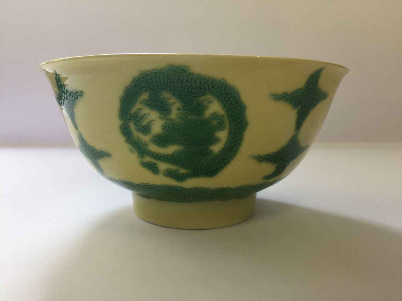 A Chinese porcelain yellow-ground green-enamelled 'dragon medallion' bowl, Kangxi mark and of the - Image 11 of 21