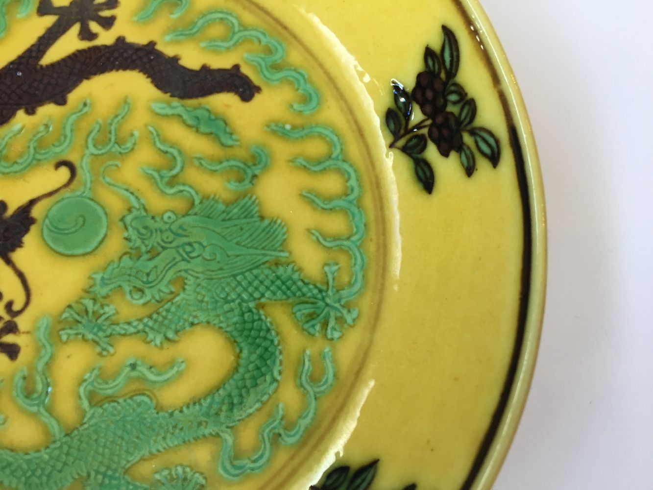 A Chinese small yellow-ground aubergine and green-decorated porcelain saucer dish, Guangxu mark - Image 6 of 12