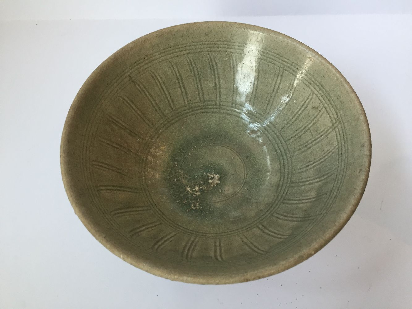 Three Thai Sawankhalok bowls, 15th-16th century, each covered in a celadon glaze, two with fluted - Image 6 of 27