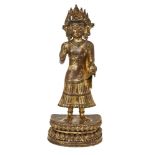 A large Sino-Tibetan gilt bronze standing figure of Avalokiteshvara, 17th century, the right hand is