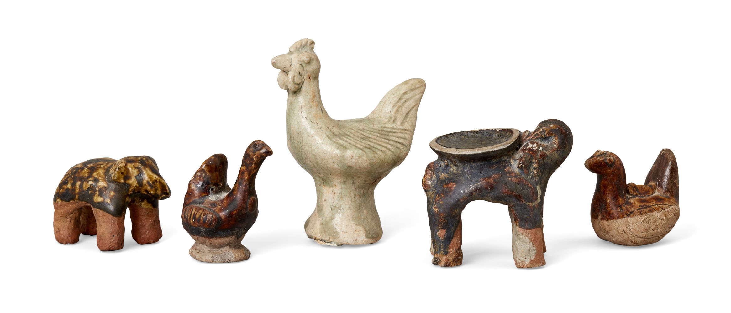 Five Sawankhalok pottery animals, 14th-15th century, comprising three chickens, a bear, and an