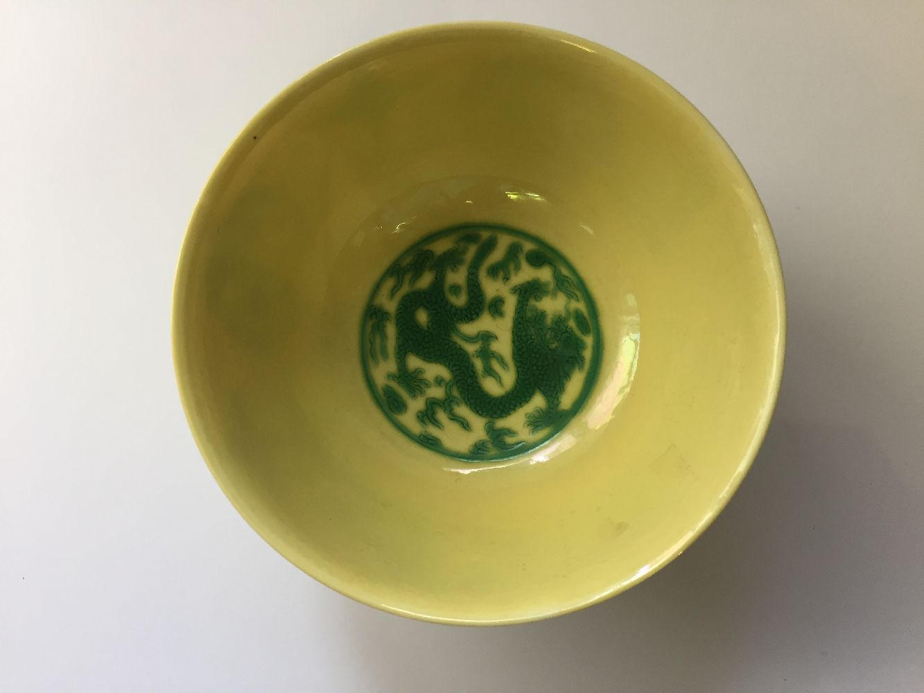 A Chinese porcelain yellow-ground green-enamelled 'dragon medallion' bowl, Kangxi mark and of the - Image 16 of 21